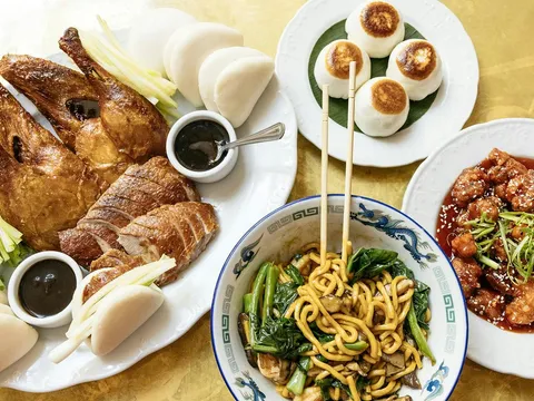 Asian food on a white plate from Brewery Bhavana